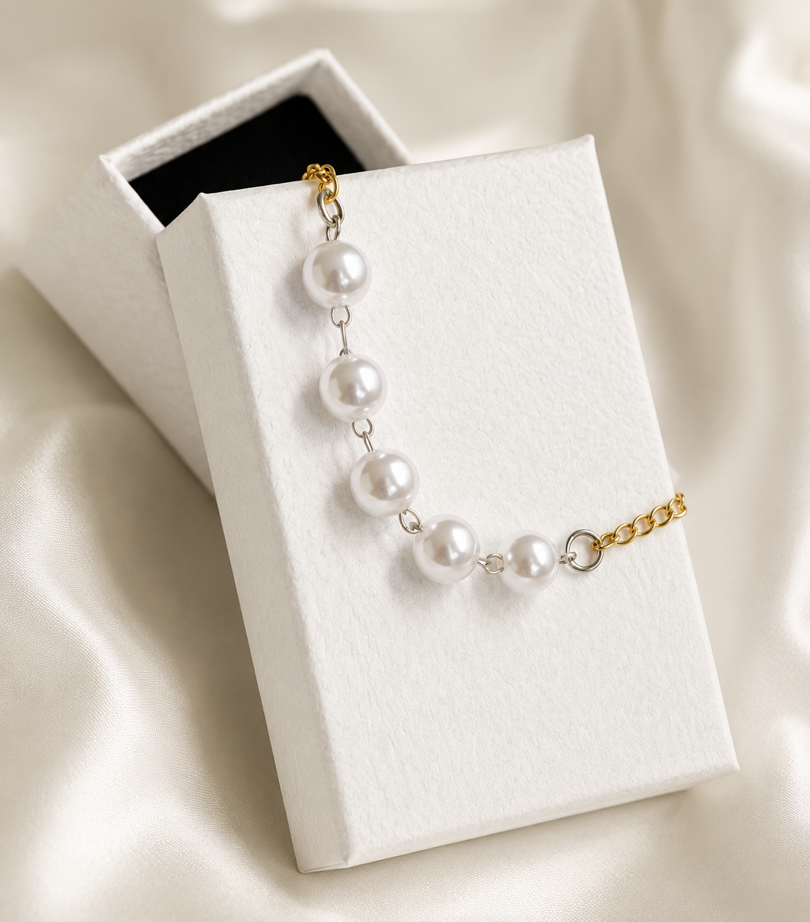 glansmix armband met parels en goud zilverkleurige glansmix armband met parels en goud zilverkleurige